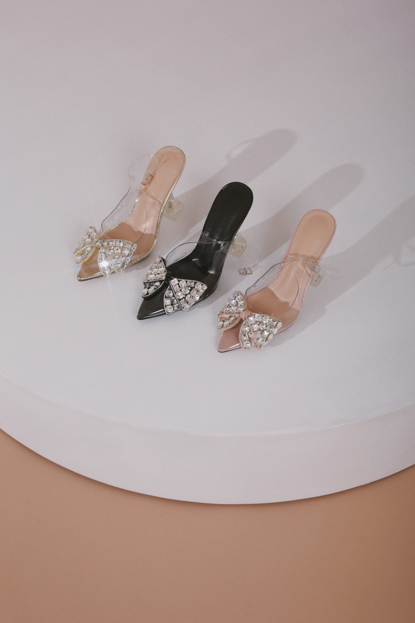 ZAPATILLA TRANSPARENTE MOÑO PIEDRAS